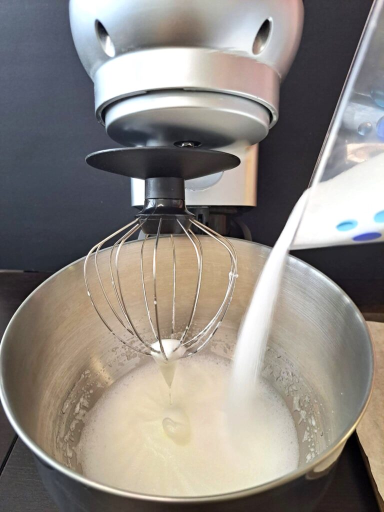 Add dry ingredients to the whipped egg whites